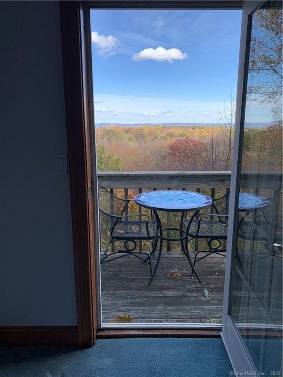 38 Merriman Lane Prospect, CT 06712 - Photo 23 of 35 a view of a room with a table and chairs