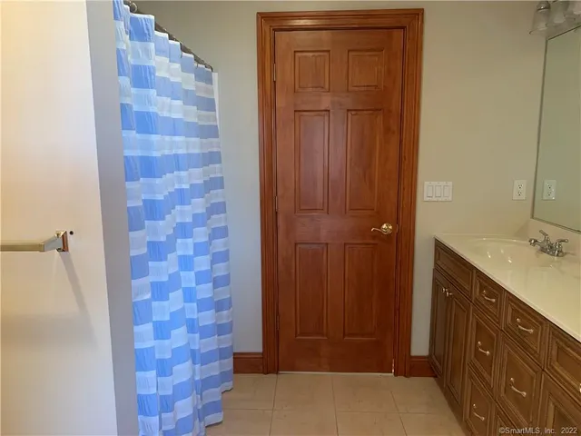 a view of room with window and furniture