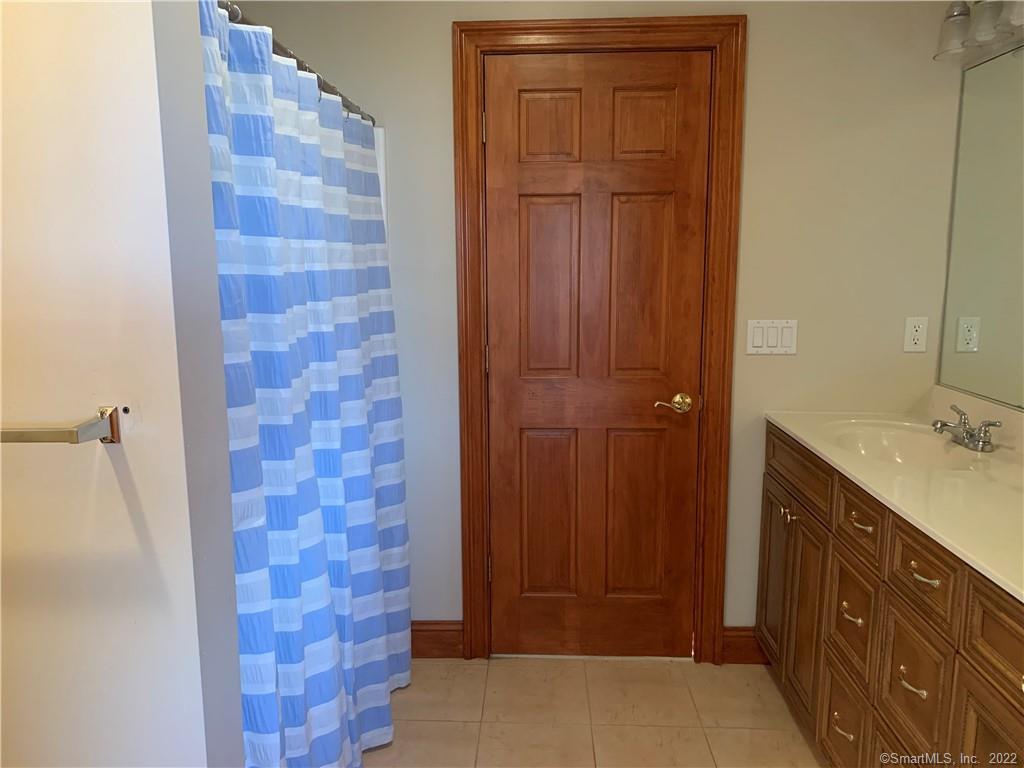 38 Merriman Lane Prospect, CT 06712 - Photo 27 of 35 a bathroom with a sink and a mirror