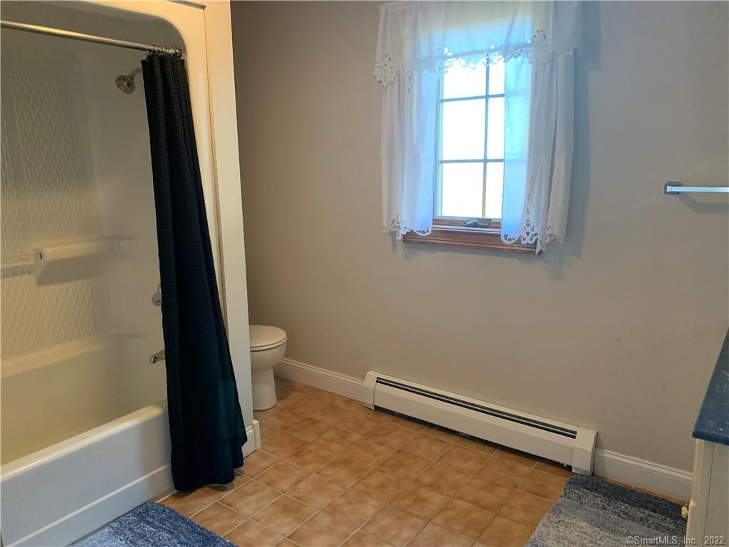 38 Merriman Lane Prospect, CT 06712 - Photo 30 of 35 a bathroom with a toilet and a shower