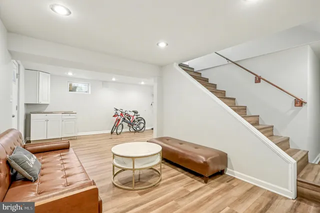 a living room with furniture and a table