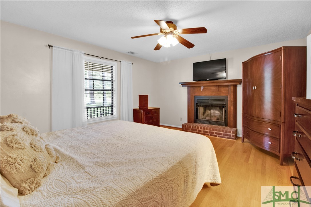 11 Frederick Street Rincon, GA 31326 - Photo 15 of 30 Large master with ensuite and fireplace..