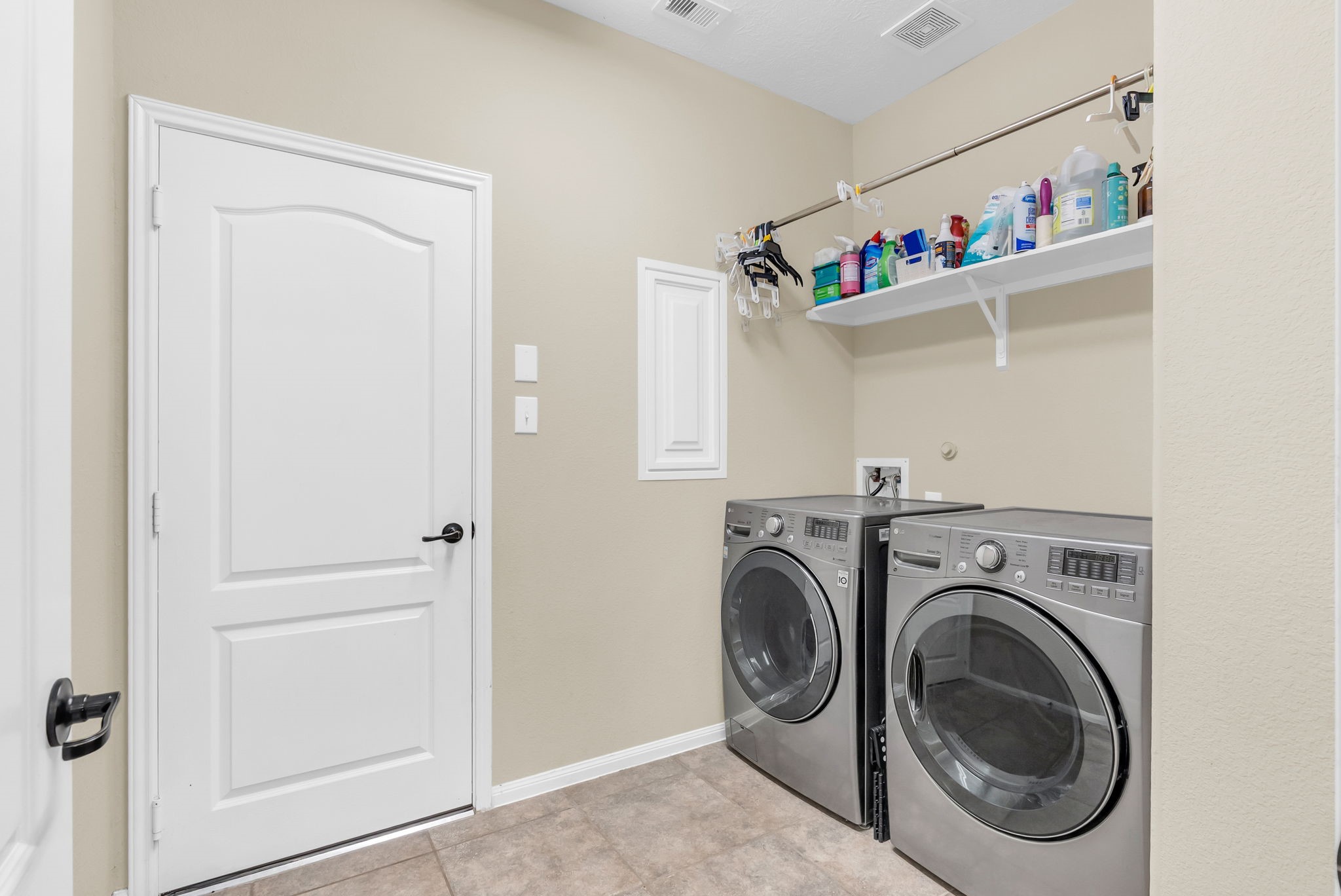 16619 Dover Mills Drive Spring, TX 77379 - Photo 36 of 49 a utility room with dryer and washer