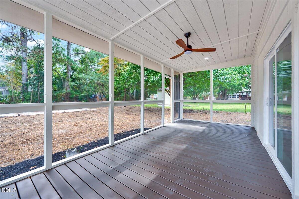 601 West Walnut Street Selma, NC 27576 - Photo 22 of 30 a view of a room with wooden floor and outdoor space