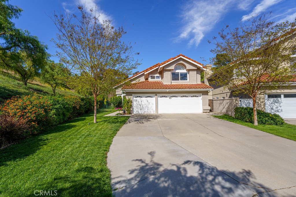 1 Sand Oaks Road Laguna Niguel, CA 92677 - Photo 1 of 1 a front view of a house with a yard and trees