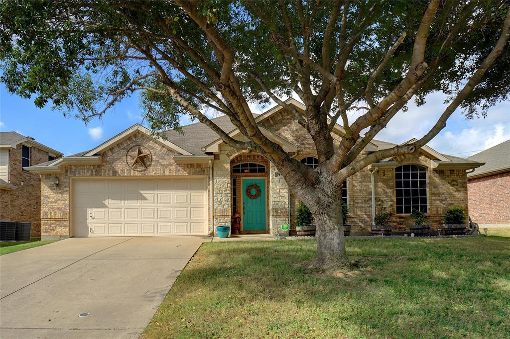 715 Boone Trail Mansfield, TX 76063 - Photo 1 of 1 a front view of a house with garden