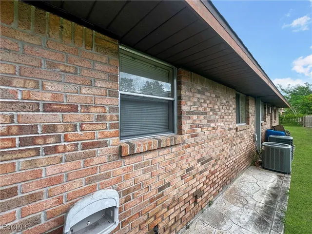 a front view of a house with a wooden floor
