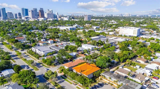 an aerial view of a city with lots of residential buildings