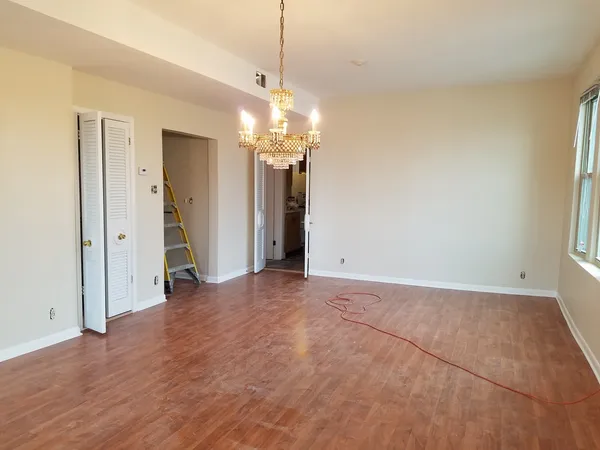 a view of a livingroom with a chandelier