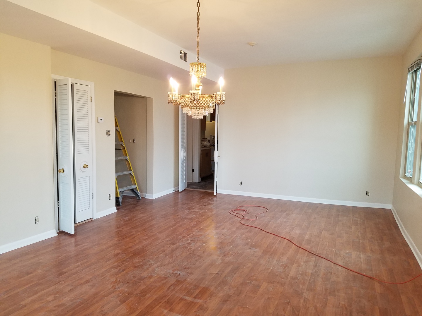 6600-04 West Roosevelt Road West Oak Park, IL 60304 - Photo 9 of 23 a view of a livingroom with a chandelier