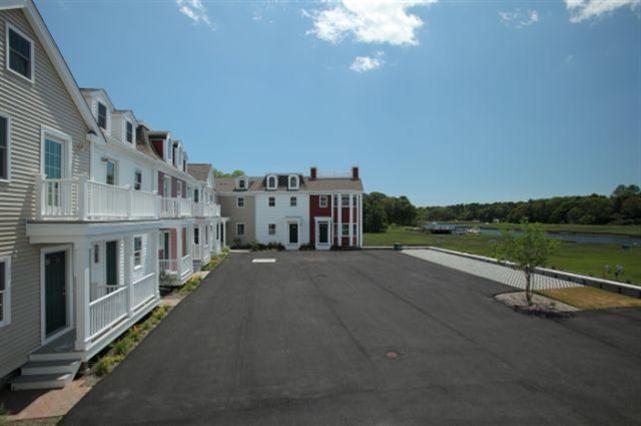 161 Route 28, Unit 7 West Harwich, MA 02671 - Photo 11 of 16 a view of a street with a building in the background