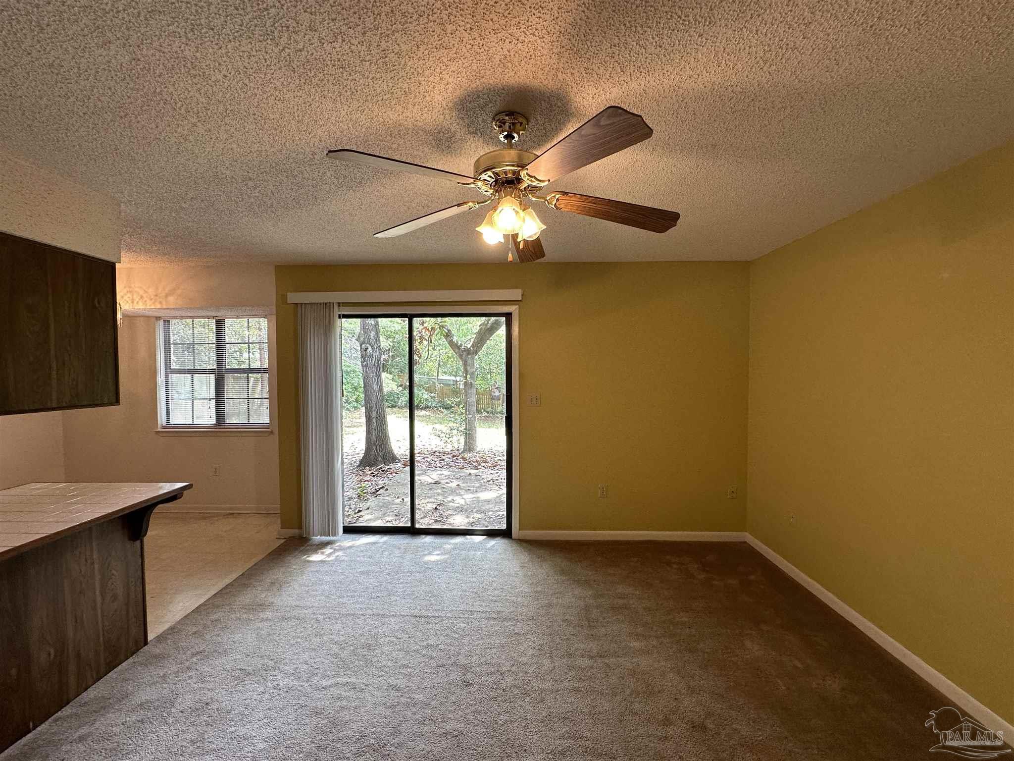 511 Maple Avenue Niceville, FL 32578 - Photo 6 of 17 a view of an empty room with a window