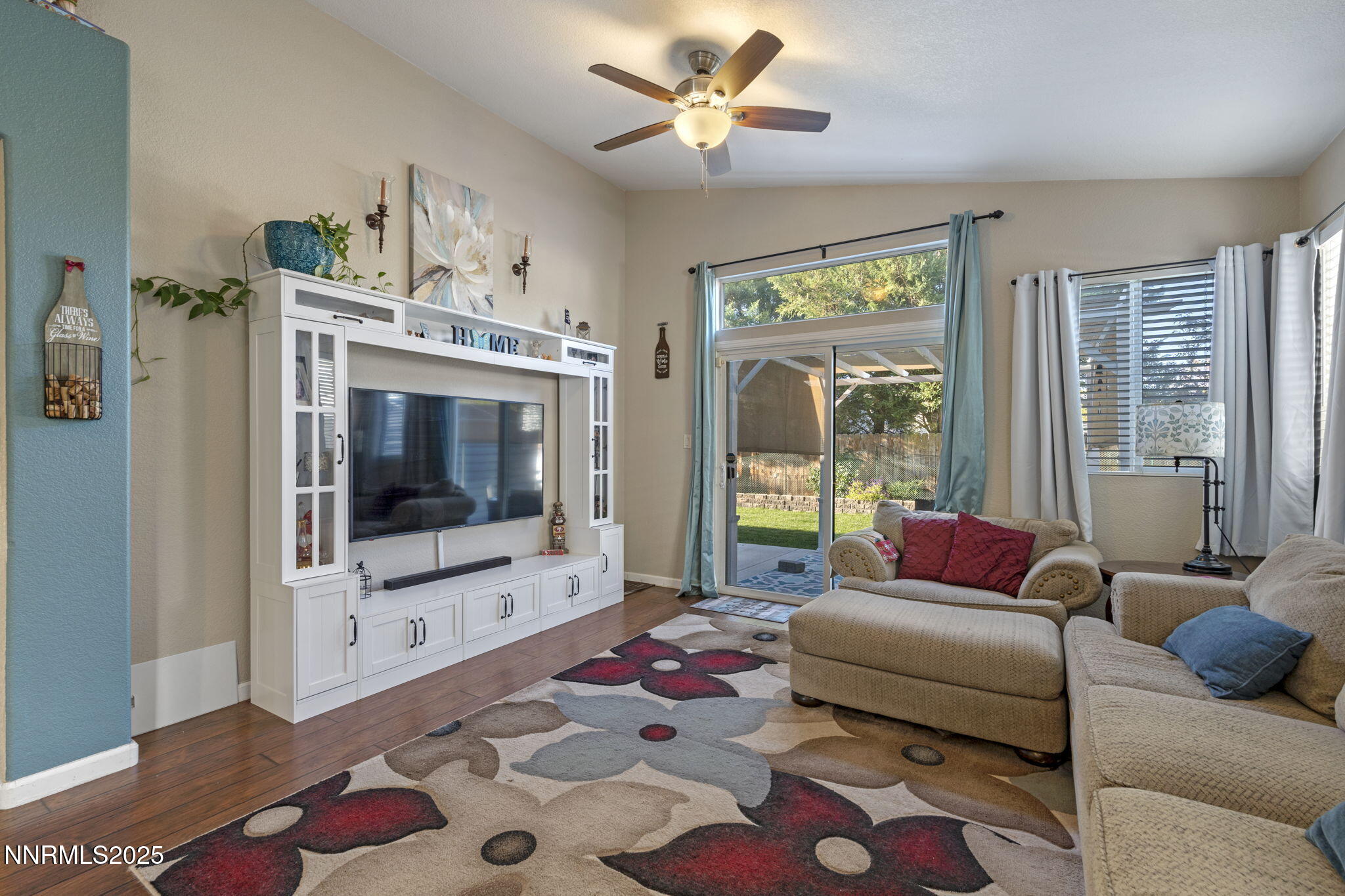 2155 Eagle Greens Drive Reno, NV 89521 - Photo 14 of 31 a living room with furniture and a flat screen tv
