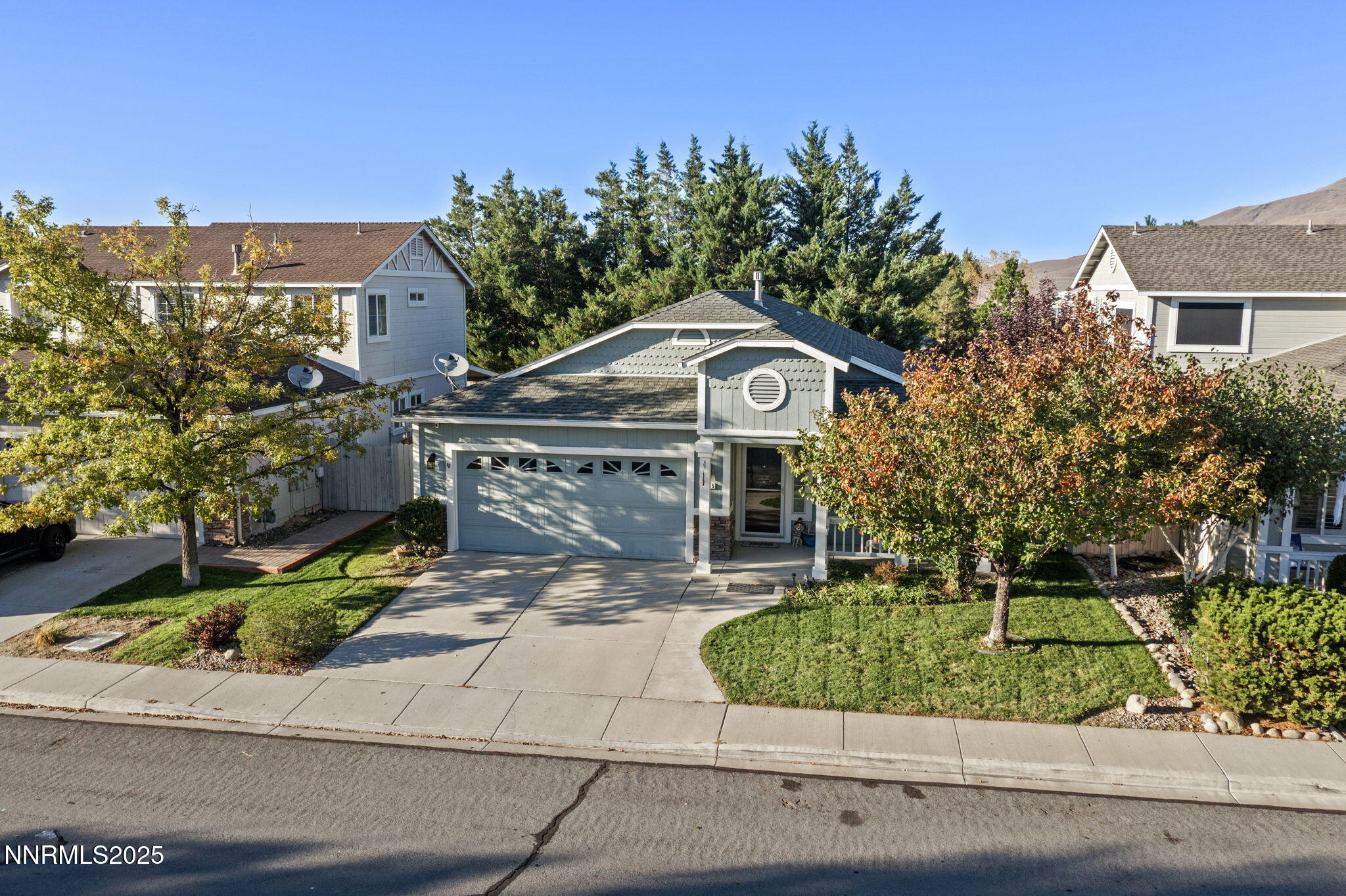 2155 Eagle Greens Drive Reno, NV 89521 - Photo 2 of 31 a front view of a house with a garden