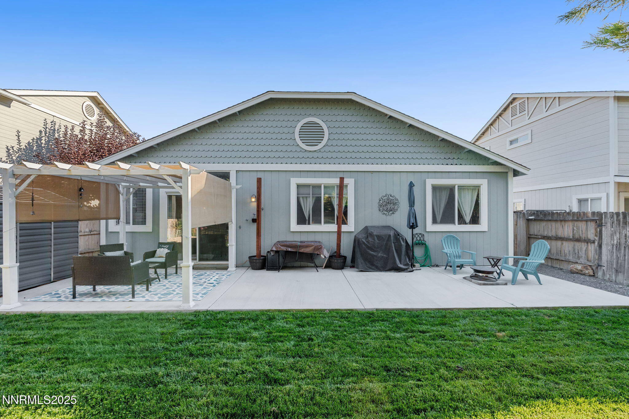 2155 Eagle Greens Drive Reno, NV 89521 - Photo 25 of 31 a front view of house with a garden and patio