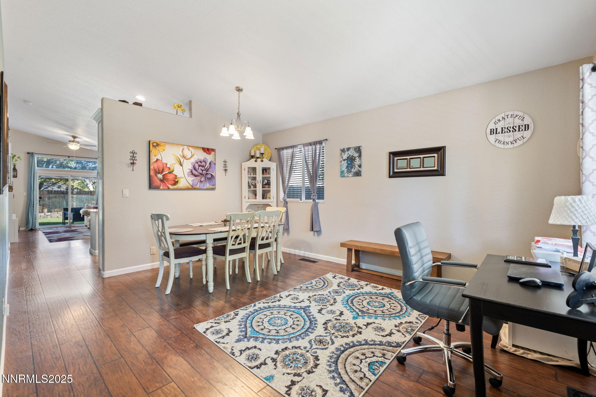 2155 Eagle Greens Drive Reno, NV 89521 - Photo 4 of 31 a view of a dining room with furniture and wooden floor