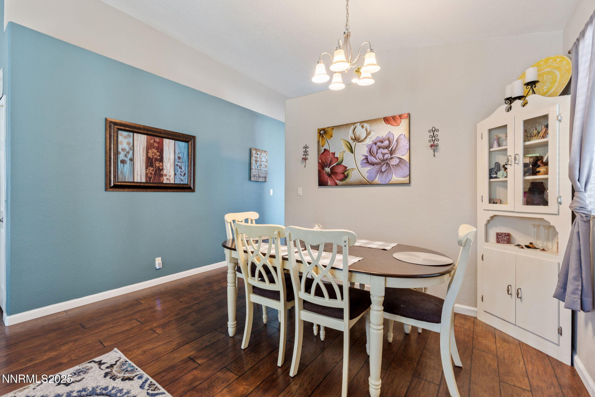 2155 Eagle Greens Drive Reno, NV 89521 - Photo 6 of 31 a view of a dining room with furniture and chandelier
