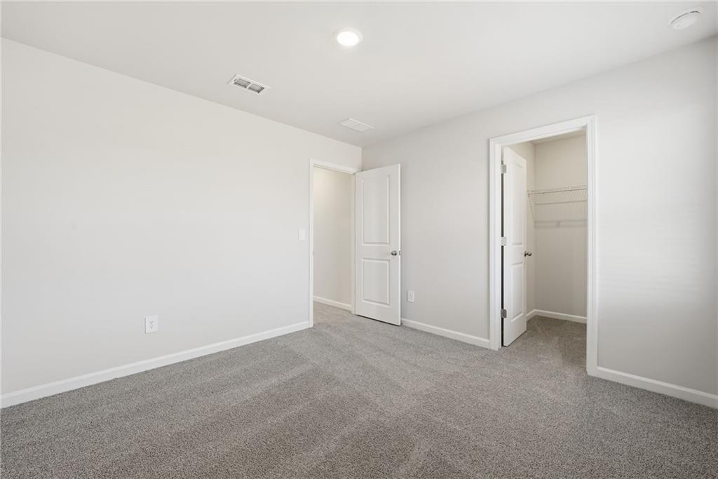1503 Wild Fox Run Lawrenceville, GA 30045 - Photo 28 of 46 a view of an empty room