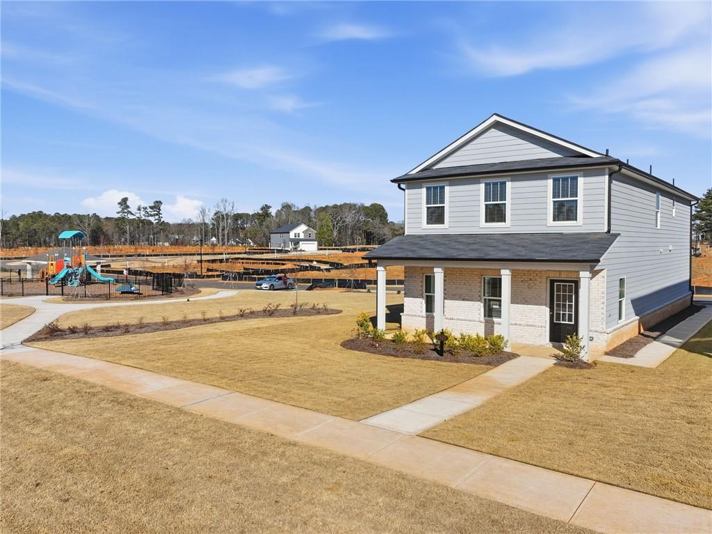 1503 Wild Fox Run Lawrenceville, GA 30045 - Photo 34 of 46 a view of a house with outdoor space and sitting area