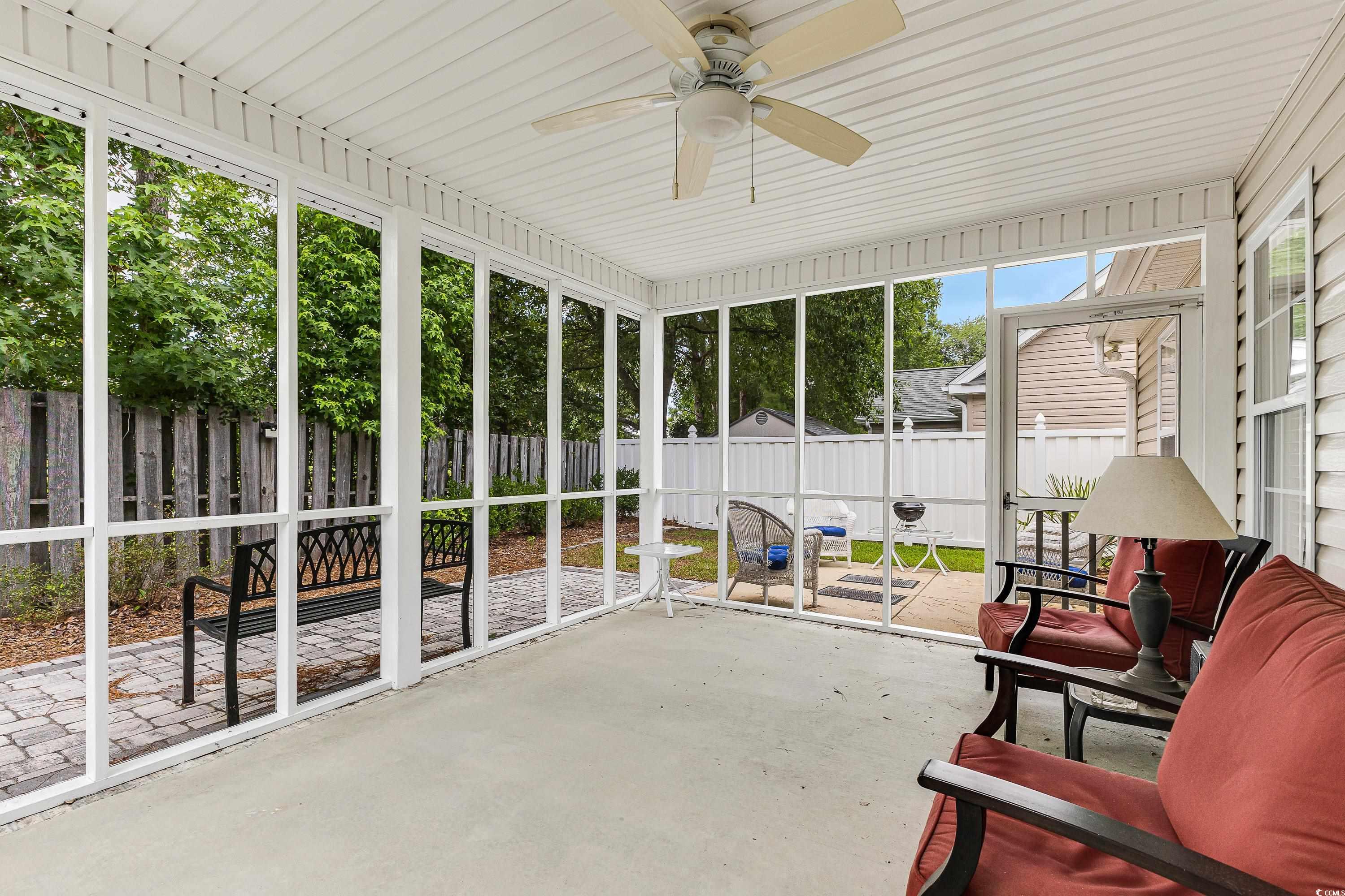 101 Cedar Tree Lane Southwest Calabash, NC 28467 - Photo 31 of 40 Sunroom / solarium with a ceiling fan