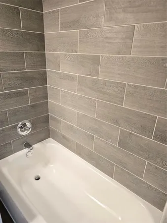 a bathroom with a white tub