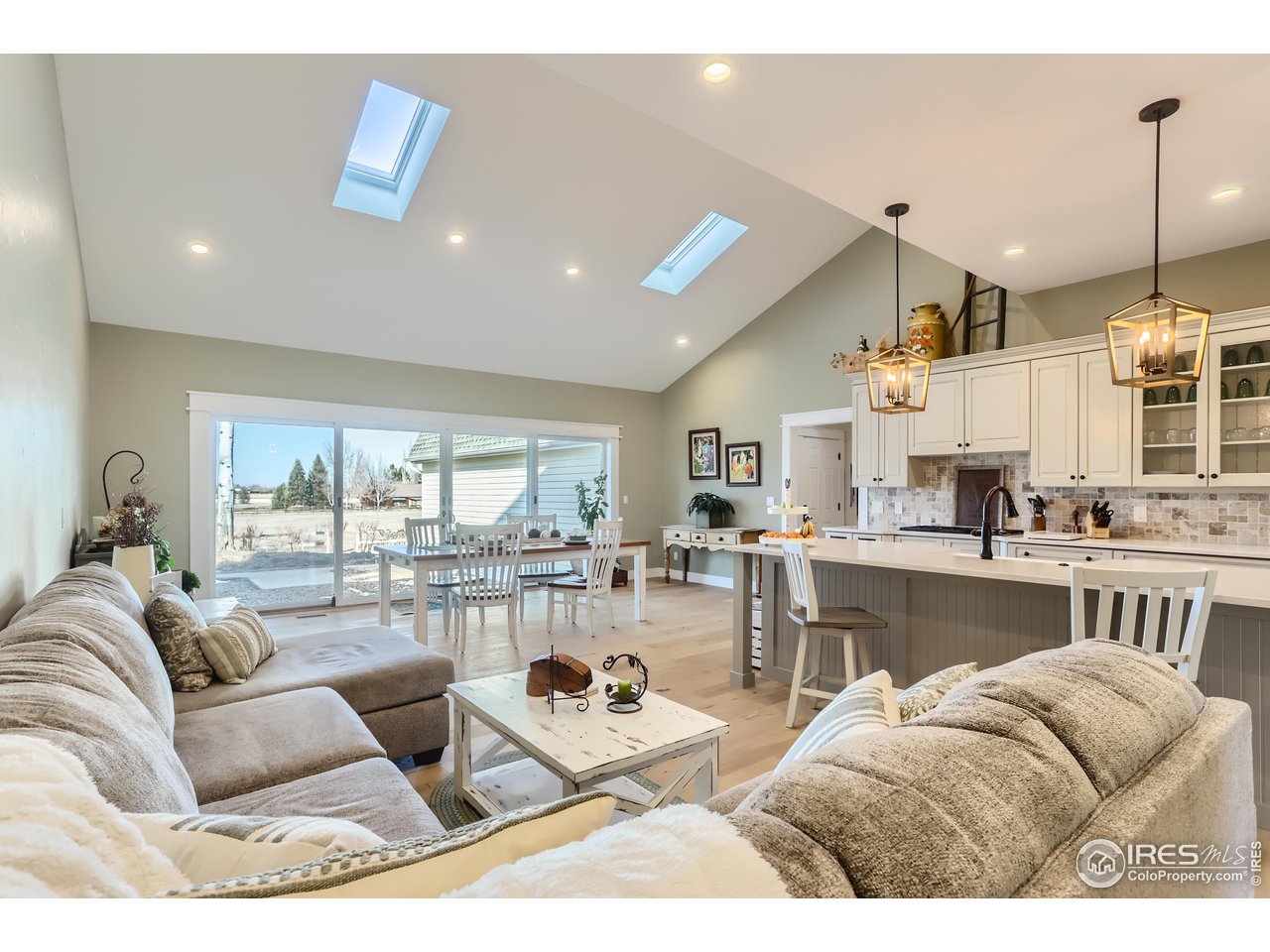 8435 Brittany Place Niwot, CO 80503 - Photo 12 of 40 a living room with furniture and a large window