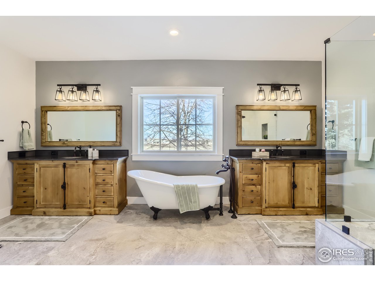 8435 Brittany Place Niwot, CO 80503 - Photo 21 of 40 a living room with furniture and a flat screen tv