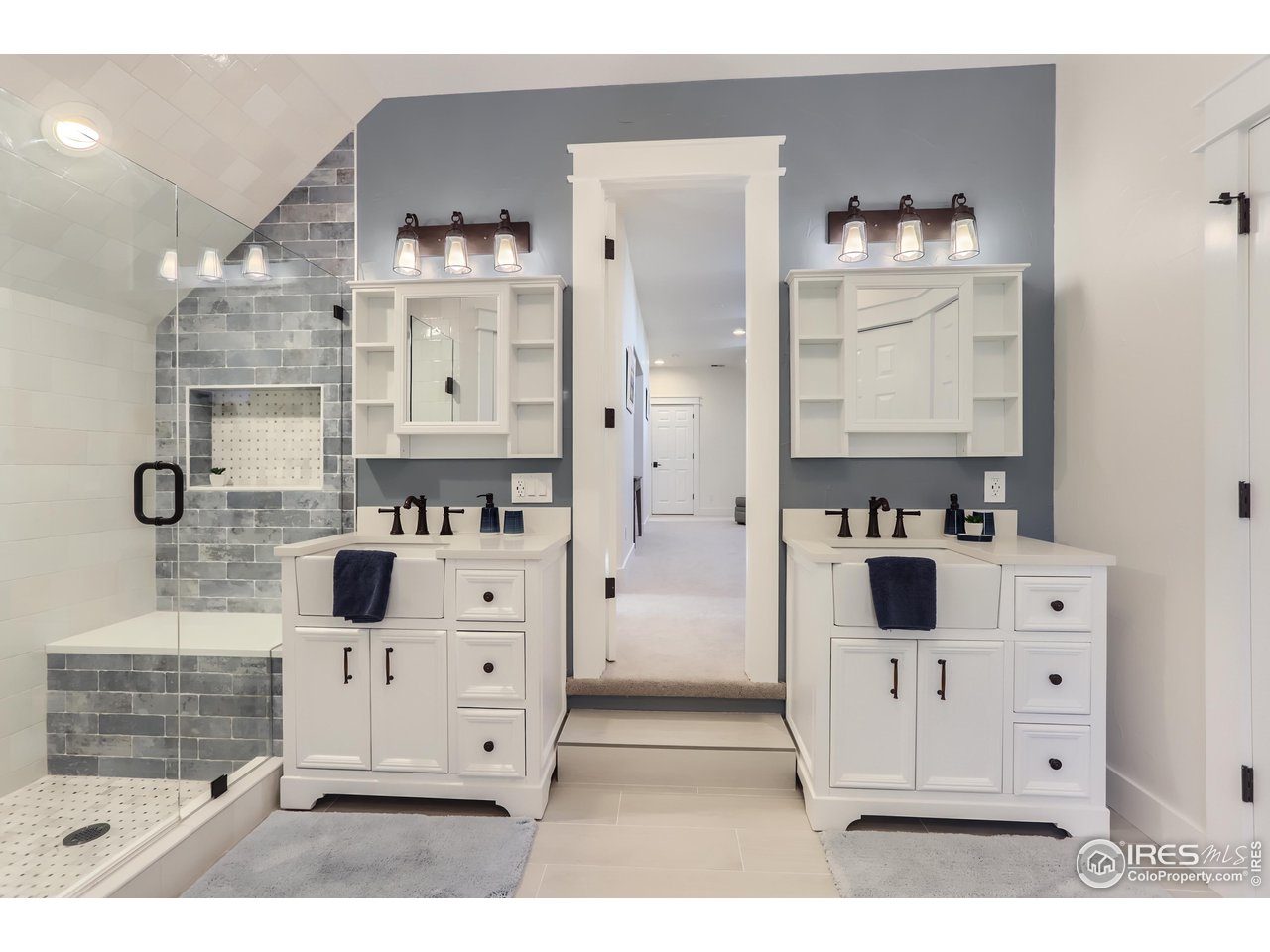 8435 Brittany Place Niwot, CO 80503 - Photo 27 of 40 a view of cabinets with white furniture