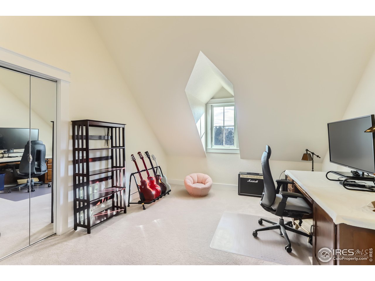 8435 Brittany Place Niwot, CO 80503 - Photo 29 of 40 a view of a workspace with furniture and a window