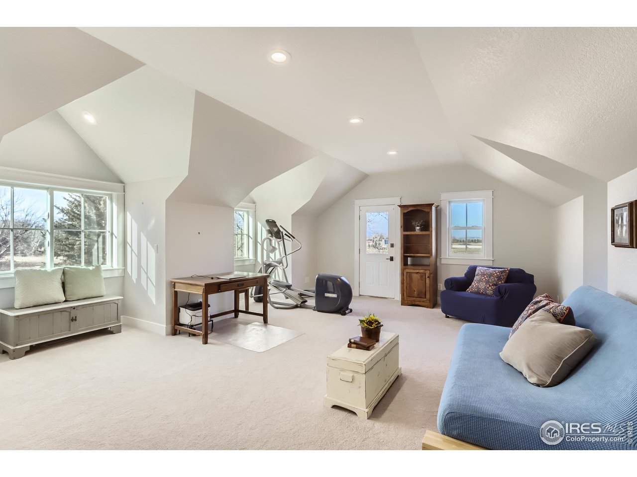 8435 Brittany Place Niwot, CO 80503 - Photo 30 of 40 a living room with furniture and a large window