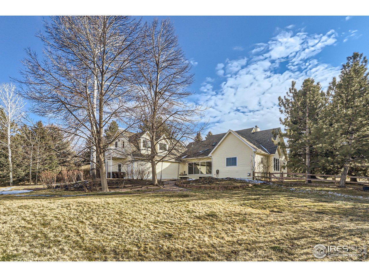 8435 Brittany Place Niwot, CO 80503 - Photo 32 of 40 a house view with a outdoor space