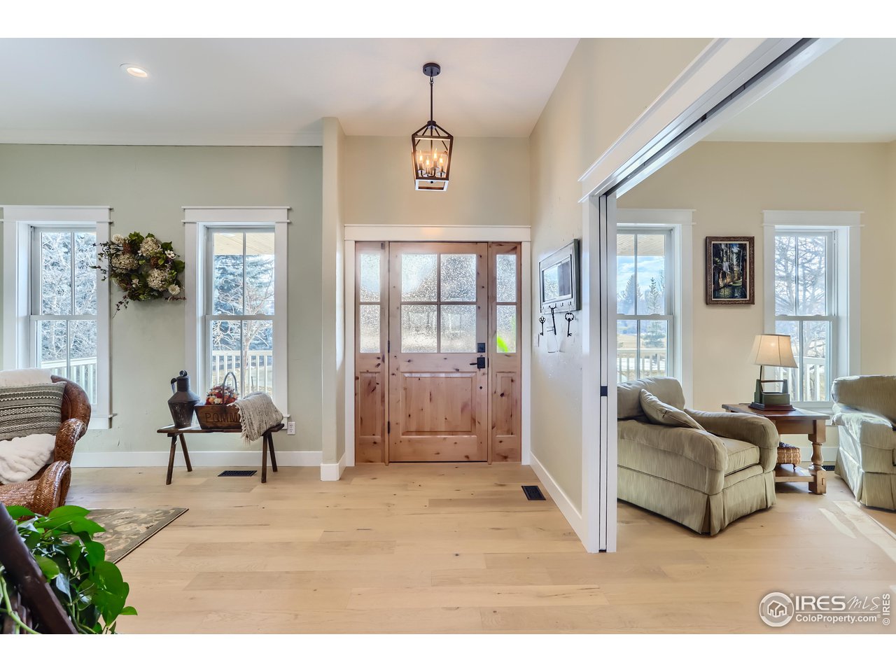 8435 Brittany Place Niwot, CO 80503 - Photo 8 of 40 a living room with furniture and a window