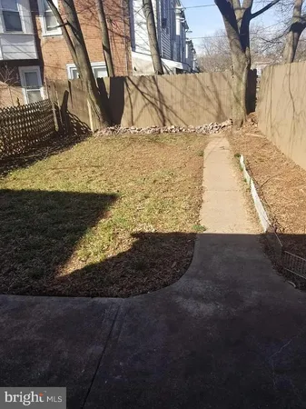 a view of a yard with street