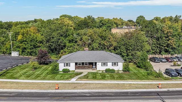 a view of a big yard in front of a house