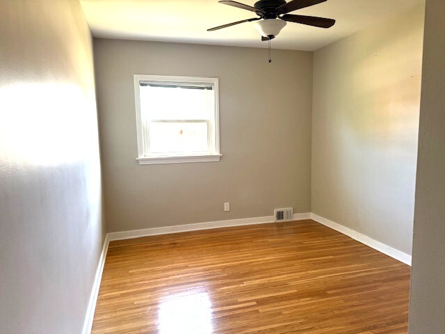 704 East 9th Street Lockport, IL 60441 - Photo 14 of 16 a view of an empty room with a window