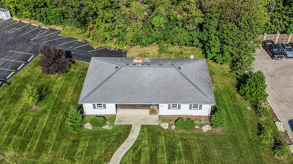 704 East 9th Street Lockport, IL 60441 - Photo 3 of 16 an aerial view of a house with a yard