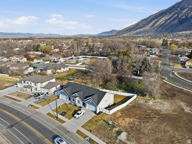 677 East 800 S Street Springville, UT 84663 - Photo 35 of 35 Aerial view of property and surrounding area with nearby suburban area and a mountainous background