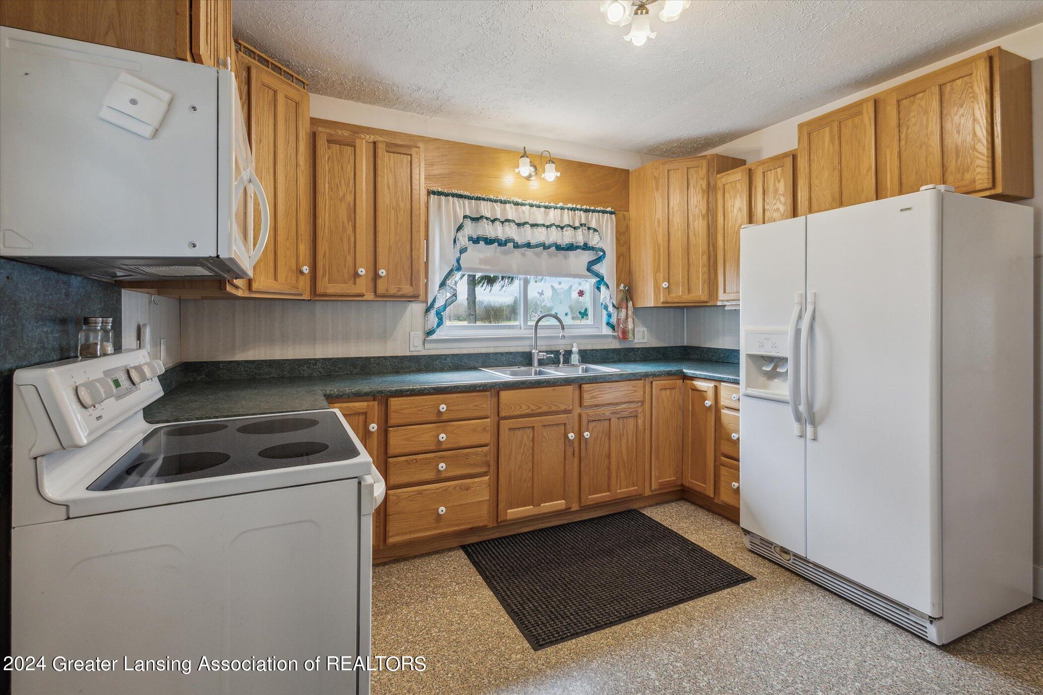 2909 East Clark Road Bath, MI 48808 - Photo 12 of 31 12-2909-E-Clark-Rd-Bath-Twp-MI-48808-Win