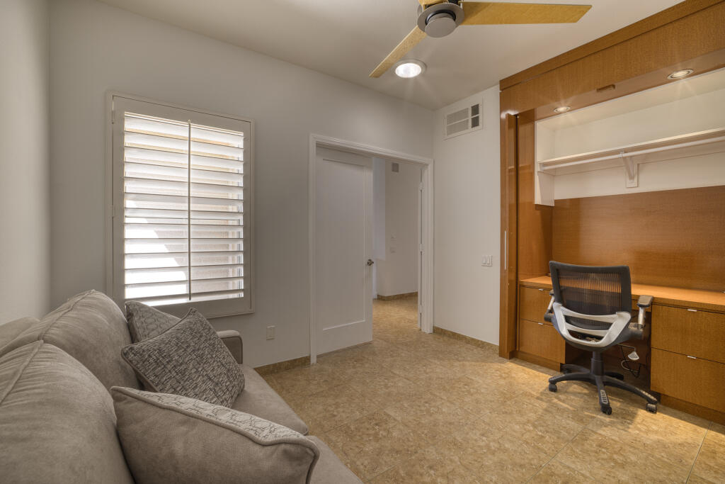 17 Lakeshore Drive Rancho Mirage, CA 92270 - Photo 7 of 23 a living room with furniture and a window
