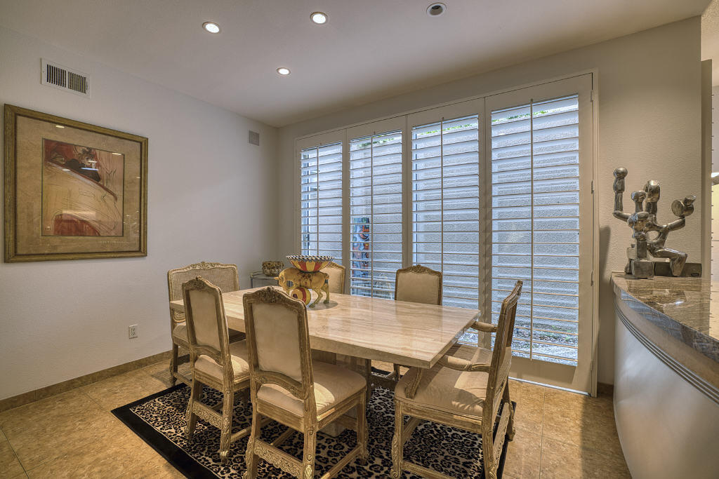 17 Lakeshore Drive Rancho Mirage, CA 92270 - Photo 9 of 23 a view of a dining room with furniture and window