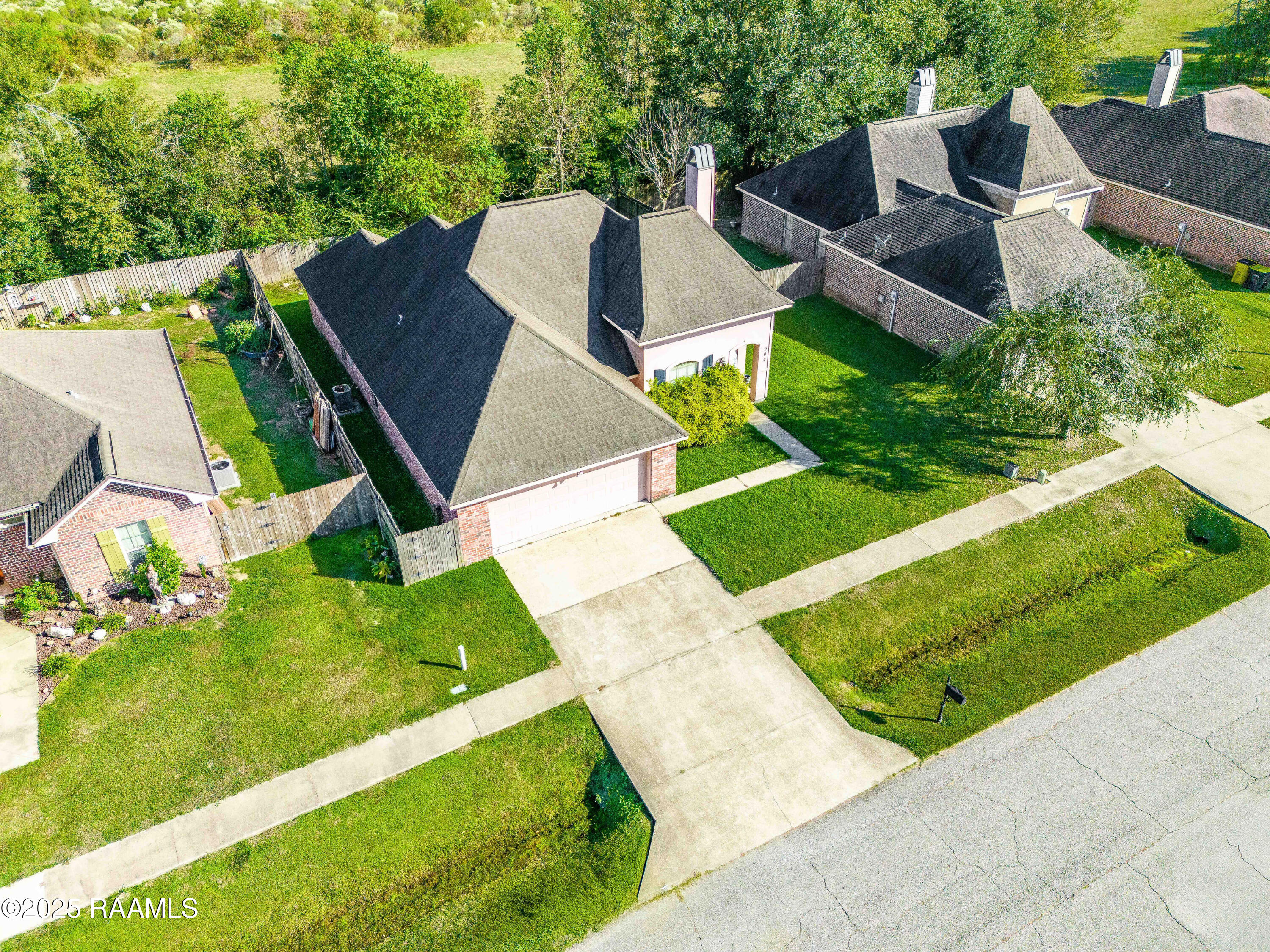 902 Pelican Ridge Cove Carencro, LA 70520 - Photo 3 of 22 DJI_20251111140836_0253_D