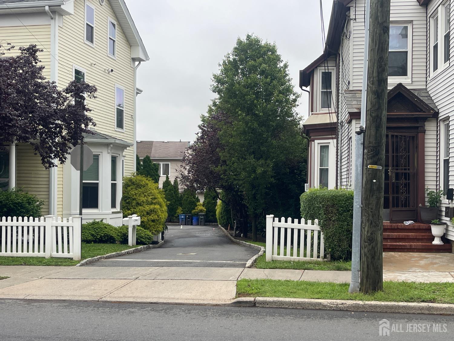 161 George Street New Brunswick, NJ 08901 - Photo 10 of 10 a front view of a house with a garden