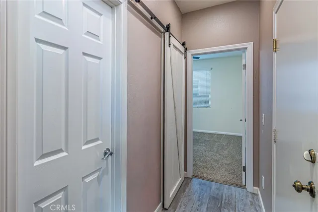 a bathroom with a glass shower door