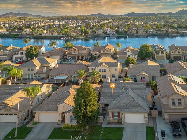 an aerial view of a city with lake view