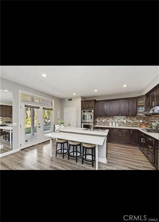 5808 Boca Raton Way Fontana, CA 92336 - Photo 8 of 14 a view of a kitchen counter top space with stainless steel appliances