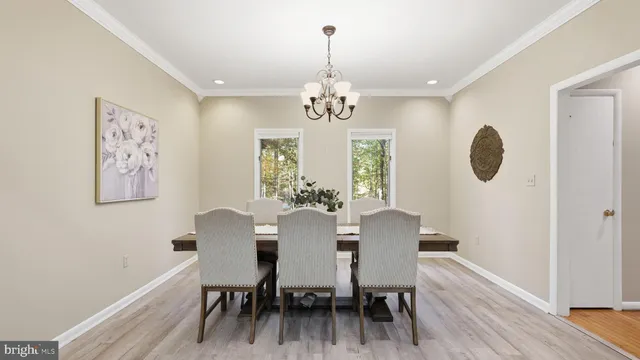 a view of a lake with houses in the back