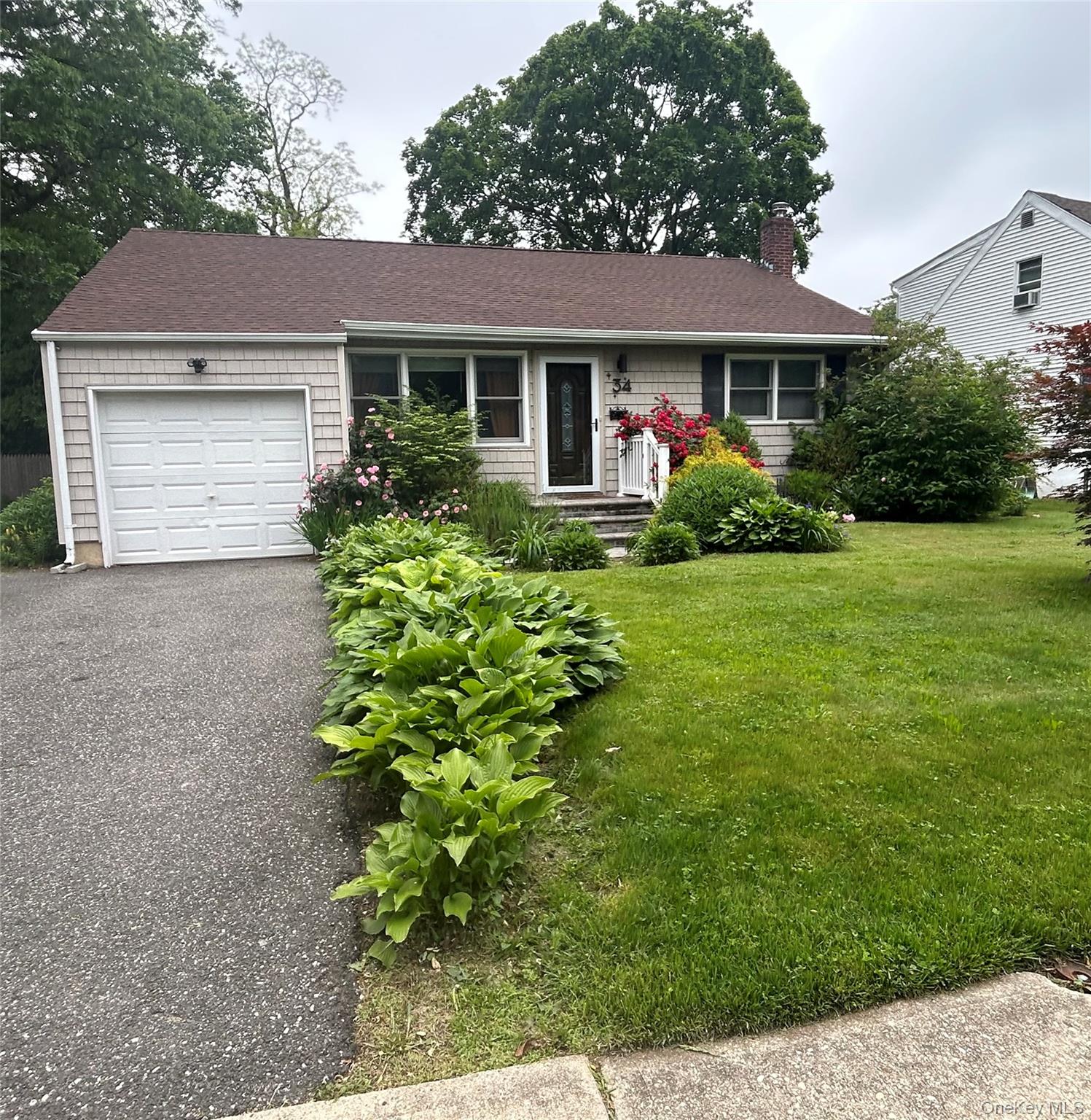 34 Woodhull Road Huntington, NY 11743 - Photo 1 of 21