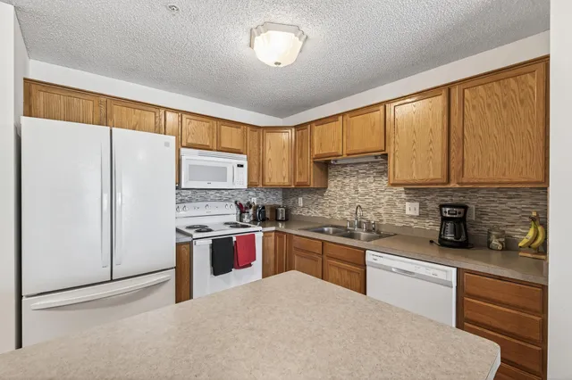 $215,000 | 2231 North Penn Place, Unit 120, North St. Paul, MN 55109