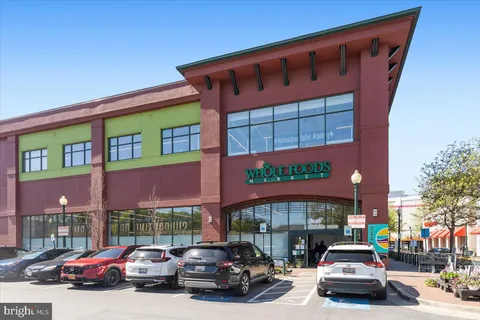 a view of a building with a yard