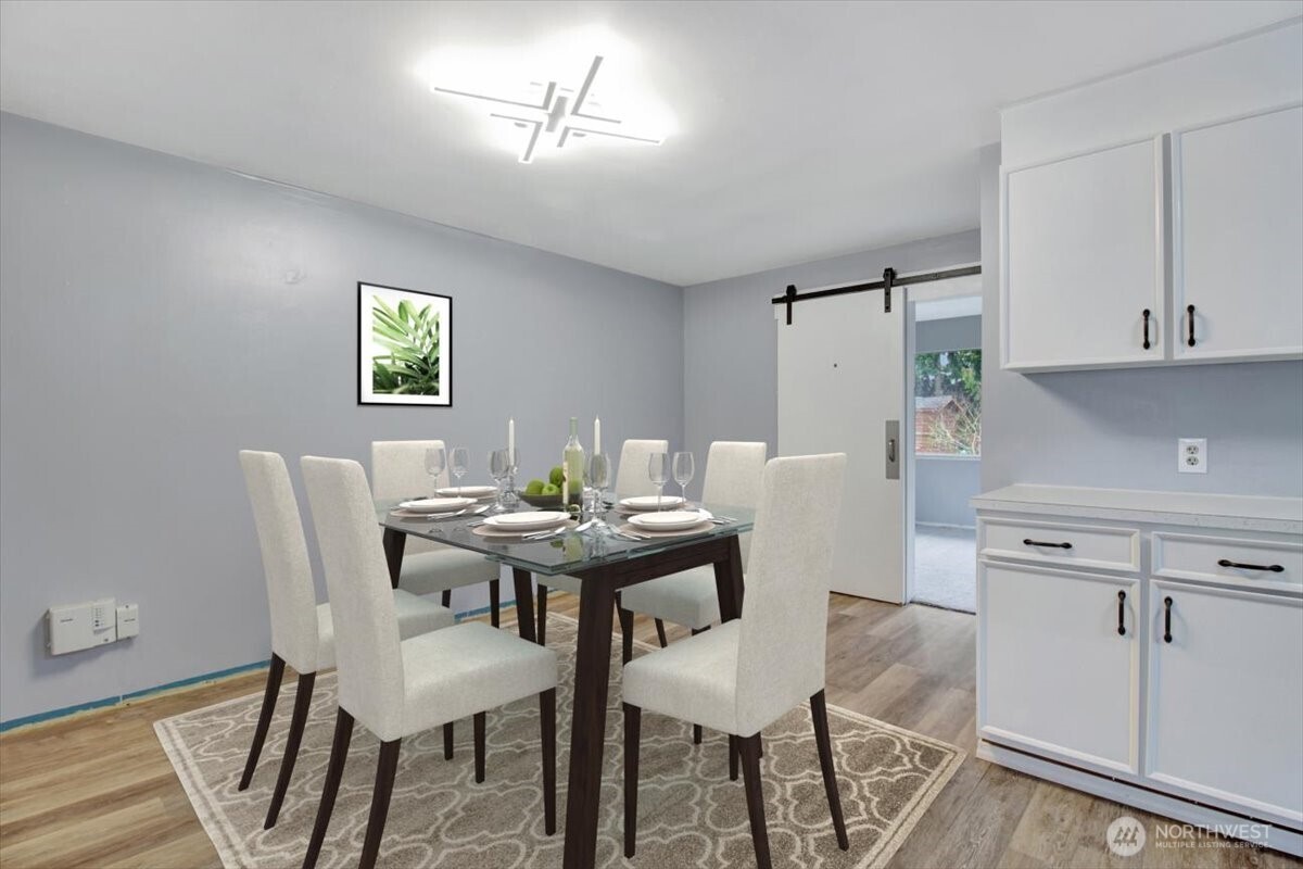 7313 228th Street Southwest Mountlake Terrace, WA 98043 - Photo 11 of 34 a view of a dining room with furniture